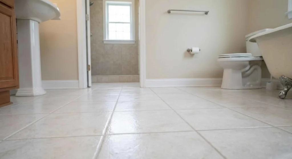 bathroom grout lines being restored
